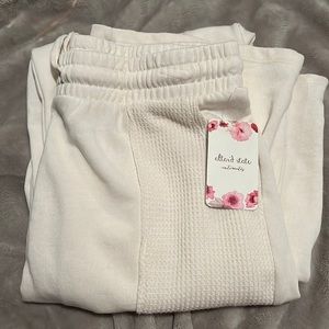 Altar’d State cream sweatpants size medium.